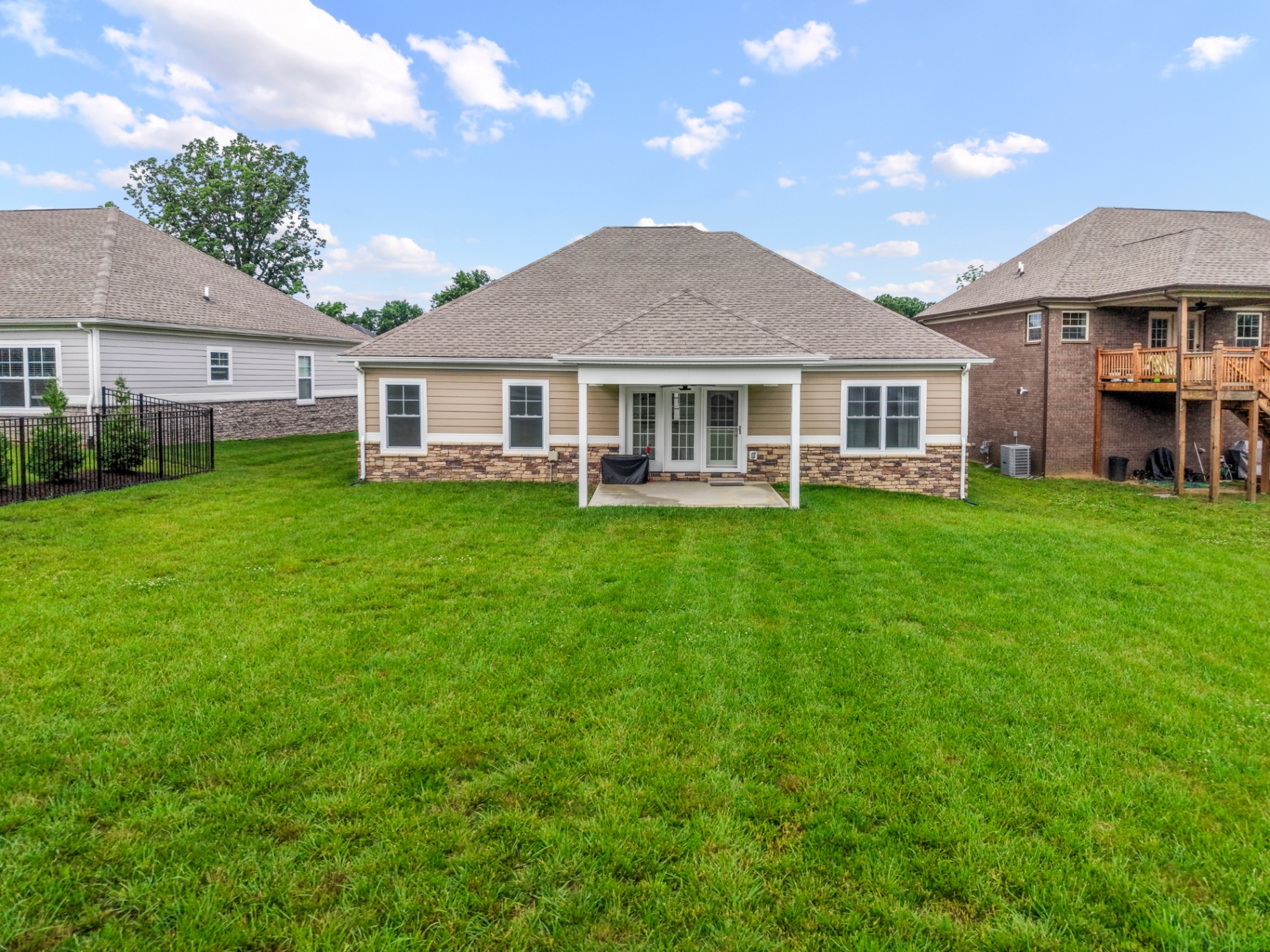 Covered patio and large backyard